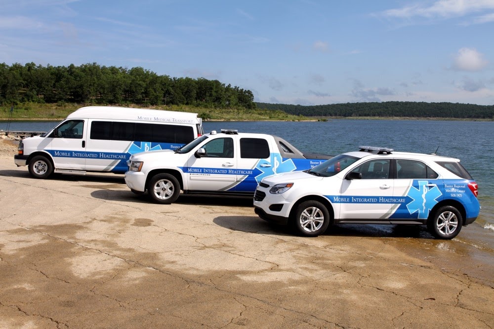 Emergency Medical Vehicles Parked by Water